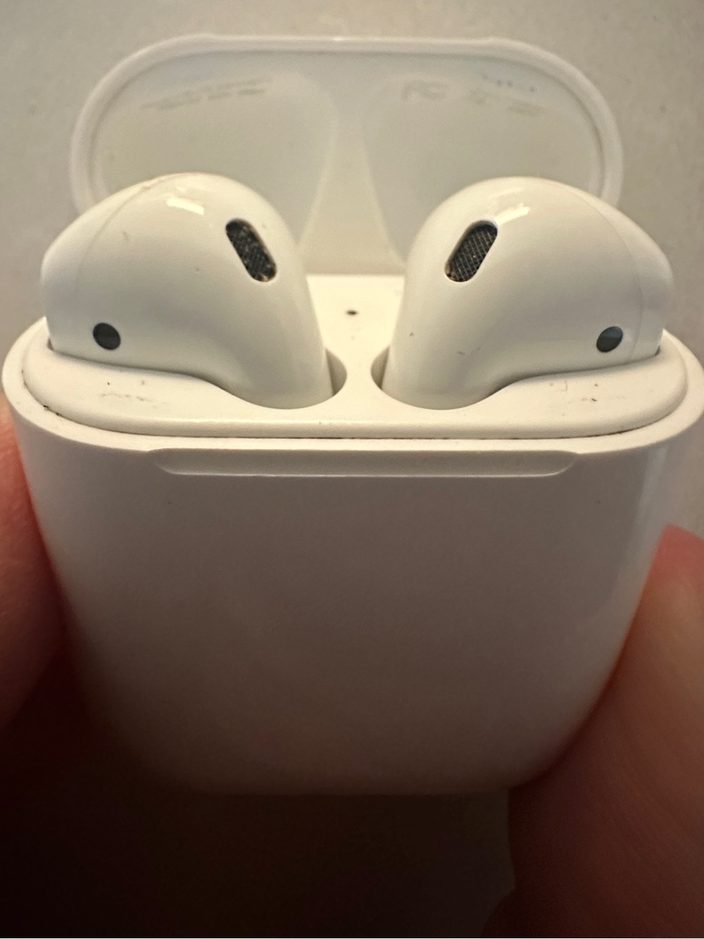 Apple White Wireless Earbuds with Charging Case and Silicone Case Cover - Used